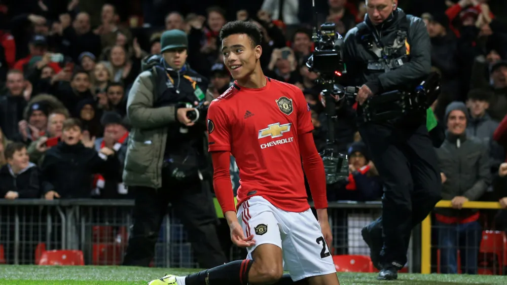 ﻿FILE PHOTO: Soccer Football - Europa League - Group L - Manchester United v AZ Alkmaar - Old Trafford, Manchester, Britain - December 12, 2019 Manchester United's Mason Greenwood celebrates scoring their second goal  REUTERS/Jon Super/File Photo