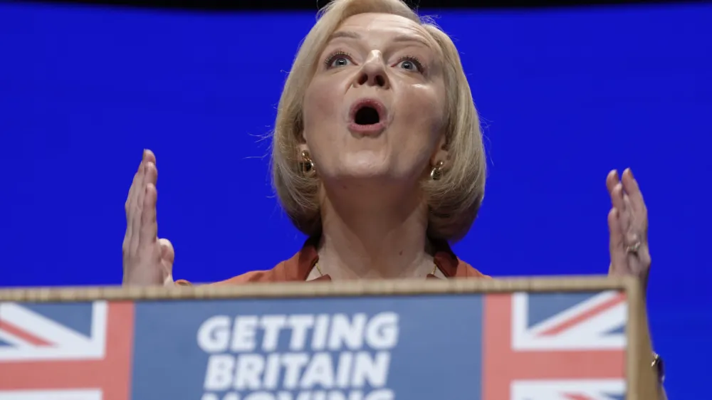 FILE - Britain's Prime Minister Liz Truss makes a speech at the Conservative Party conference at the ICC in Birmingham, England, Wednesday, Oct. 5, 2022. Truss has only been in office for six weeks. But already her libertarian economic policies have triggered a financial crisis, emergency central bank intervention, multiple U-turns and the firing of her Treasury chief. (AP Photo/Kirsty Wigglesworth, File)