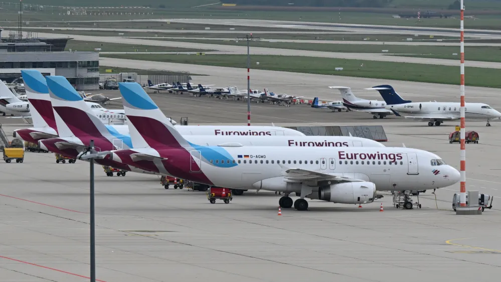 FILED - 06 October 2022, Stuttgart: Aircraft's of Eurowings airline are seen parked on the apron of the airport in Stuttgart. Photo: Bernd Weißbrod/dpa