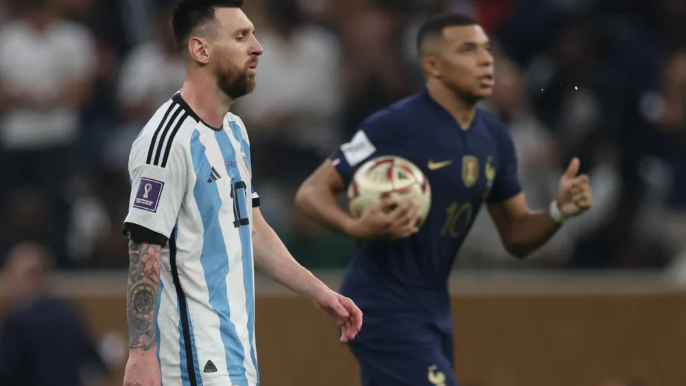 Soccer Football - FIFA World Cup Qatar 2022 - Final - Argentina v France - Lusail Stadium, Lusail, Qatar - December 18, 2022 Argentina's Lionel Messi looks dejected after France's Kylian Mbappe scores their first goal REUTERS/Lee Smith