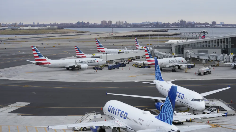 Planes sit on the tarmac at Terminal B at LaGuardia Airport in New York, Wednesday, Jan. 11, 2023. The Federal Aviation Administration is lifting a ground stop on flights across the U.S. following a computer outage early Wednesday that resulted in thousands of delays and hundreds of cancellations quickly cascading through the system at airports nationwide. (AP Photo/Seth Wenig)