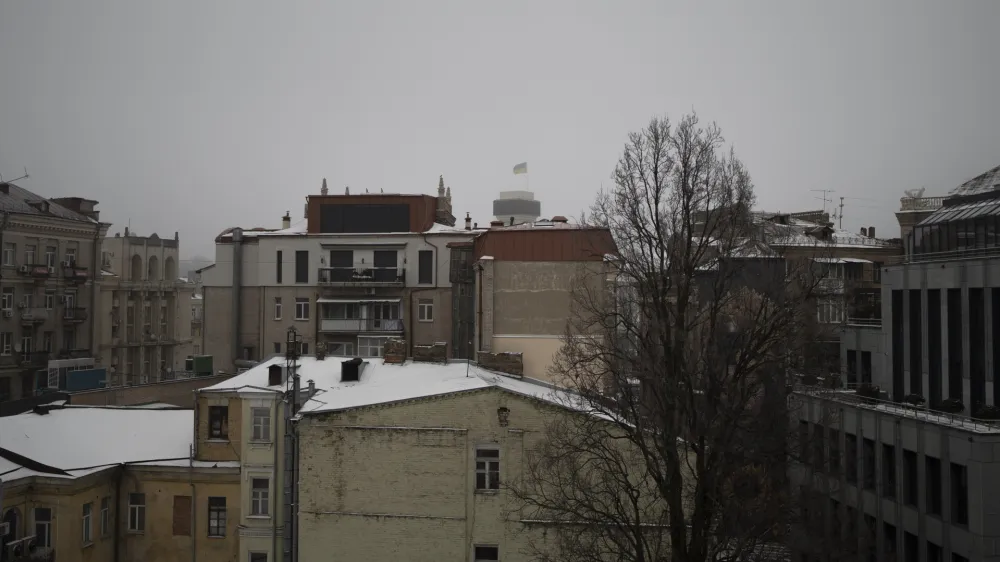 Buildings in central Kyiv as the sound of air defense and explosions are heard across Kyiv, Ukraine, Saturday, Jan. 14, 2023. A series of explosions were heard in Kyiv on Saturday morning before the air raid sirens sounded. Deputy head of Ukraine's presidential office Kyrylo Tymoshenko said on Telegram that a missile attack on critical infrastructure in the capital was underway. (AP Photo/Roman Hrytsyna)