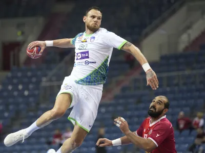 Slovenia's Borut Mackovsek makes a shot during the Main Round Group I, Handball World Championship match between Iran and Slovenia in Krakow, Poland, Wednesday, Jan. 18, 2023 (AP Photo/Piotr Hawalej)