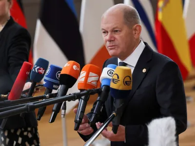 German Chancellor Olaf Scholz speaks to the media as he attends the European leaders summit in Brussels, Belgium February 9, 2023. REUTERS/Yves Herman