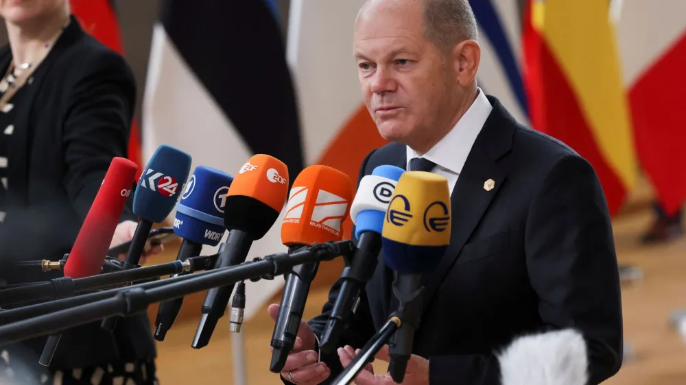 German Chancellor Olaf Scholz speaks to the media as he attends the European leaders summit in Brussels, Belgium February 9, 2023. REUTERS/Yves Herman