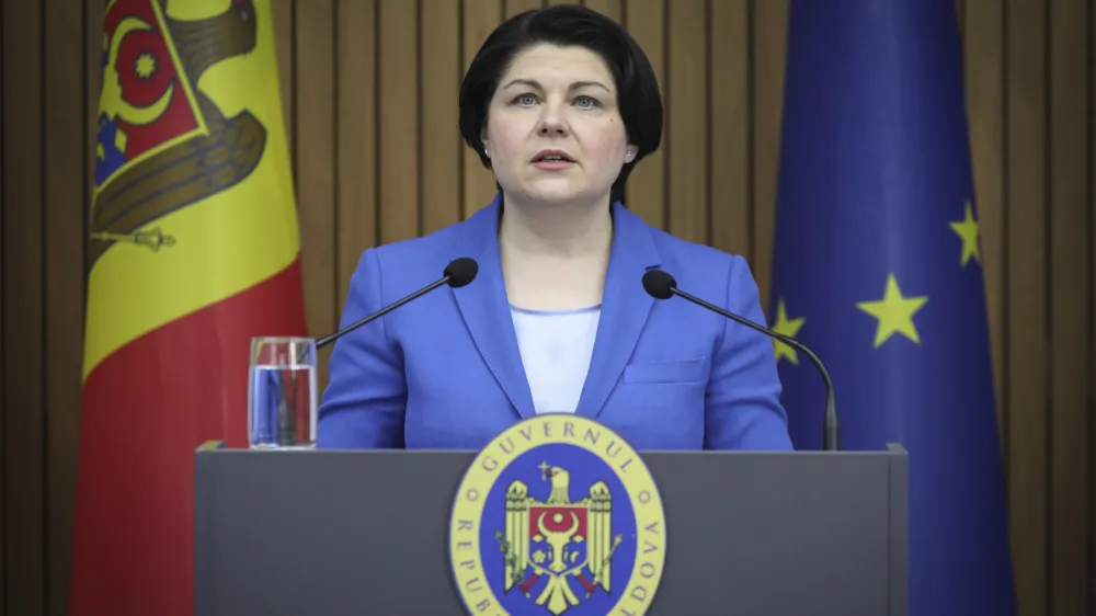 Moldovan Prime Minister Natalia Gavrilita announces her resignation during a news conference in Chisinau, Moldova, Friday, Feb 10, 2023. Moldova's government collapsed Friday as pro-Western Prime Minister Natalia Gavrilita resigned, adding to a series of crises that have gripped the small nation since Russia invaded its neighbor, Ukraine. (AP Photo/Aurel Obreja)