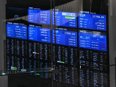 Stock prices are seen on board at the Tokyo Stock Exchange on Dec. 12, 2022, in Tokyo, Japan. Asian shares were mostly higher Friday, Jan. 6, 2023, after Wall Street benchmarks fell on worries that the U.S. Federal Reserve will keep raising interest rates. (AP Photo/Shuji Kajiyama)