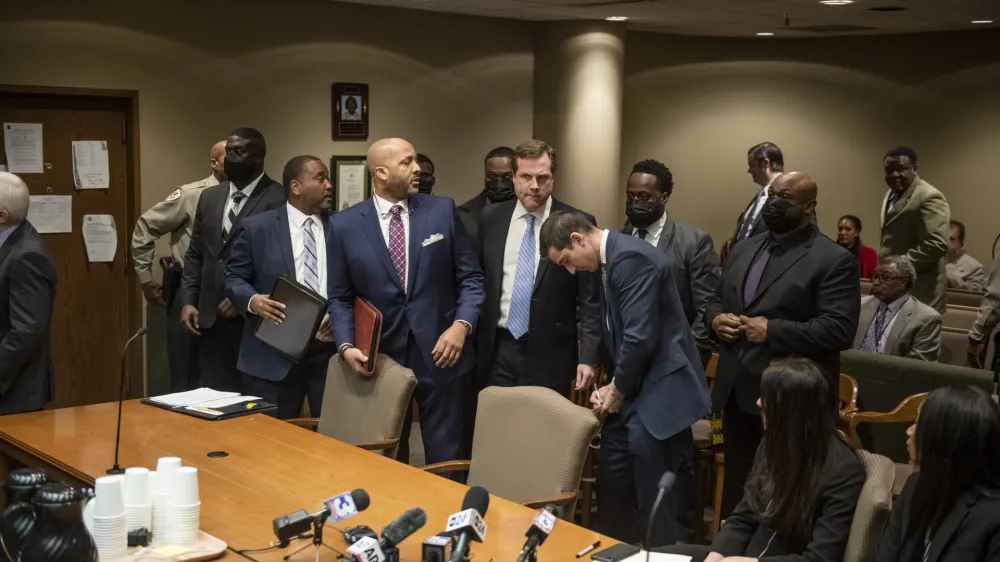 The former Memphis police officers accused of murder in the death of Tyre Nichols appear with their attorneys at an indictment hearing at the Shelby County Criminal Justice Center Friday, Feb. 17, 2023, in Memphis, Tenn. The former police officers pleaded not guilty to second-degree murder and other charges in the violent arrest and death of Nichols, (AP Photo/Brandon Dill)