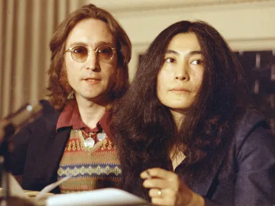 Former Beatle John Lennon and his wife, Yoko Ono, speak at a news conference in New York City, April 2, 1973. Lennon said he has appealed a federal deportation decision orderng him to leave the country in less than two months. His lawyer said the legal action could keep Lennon in the country for years. (AP Photo)