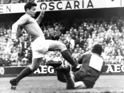 FILE - France's Just Fontaine, left, tries to go past Brazil's goalkeeper Gilmar tackles in their semifinal match in Stockholm, on June 24, 1958. Fontaine's former club Reims announced Fontaine's death on Wednesday, March 1, 2023. He was 89. (AP Photo/Reportagebild, Pool, File)