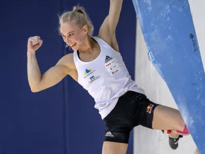 Slovenia's Janja Garnbret cheers during the women's boulder semifinal of the European Sport Climbing Championships in Munich, Germany, Sunday, Aug. 14, 2022. (Georgios Kefalas/Keystone via AP)