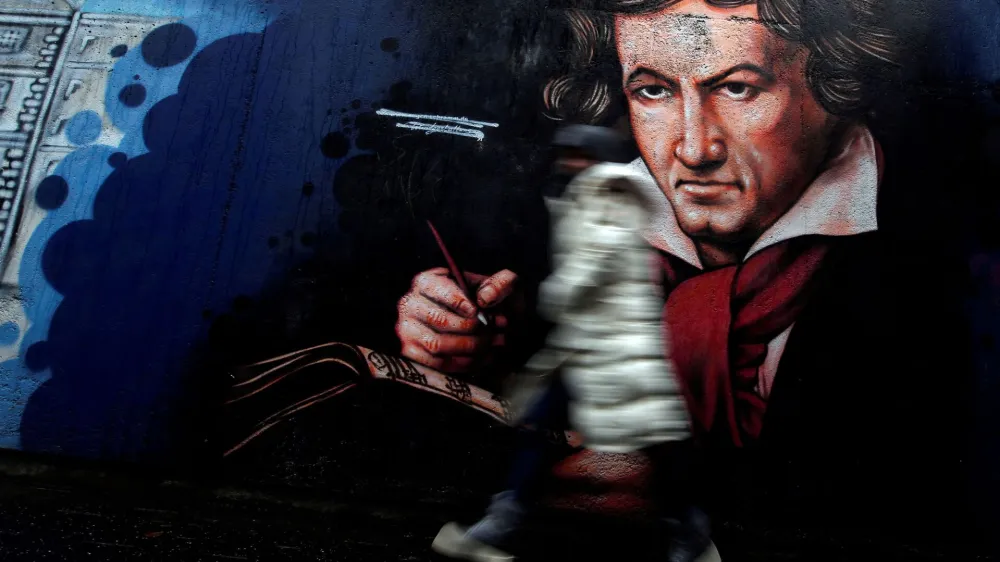 FILE PHOTO: A mural of Ludwig van Beethoven is seen at a pedestrian tunnel ahead of his 250th birth anniversary in Bonn, Germany December 13, 2019. REUTERS/Leon Kuegeler/File Photo
