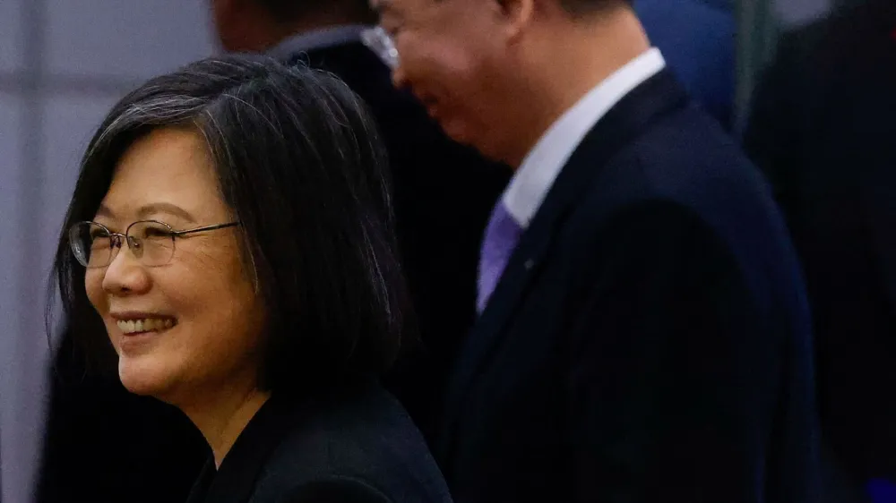 Taiwanese President Tsai Ing-wen smiles towards the media before her departure to New York to start her trip to Guatemala and Belize at Taoyuan International Airport in Taoyuan, Taiwan March 29, 2023. REUTERS/Ann Wang