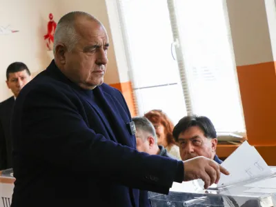 Boyko Borissov, former Bulgarian Prime Minister and leader of centre-right GERB party, casts his vote during the parliamentary election, in Sofia, Bulgaria, April 2, 2023. REUTERS/Stoyan Nenov