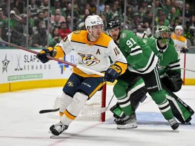 Apr 3, 2023; Dallas, Texas, USA; Nashville Predators center Colton Sissons (10) and Dallas Stars center Tyler Seguin (91) look for the puck in the Dallas zone during the first period at the American Airlines Center. Mandatory Credit: Jerome Miron-USA TODAY Sports