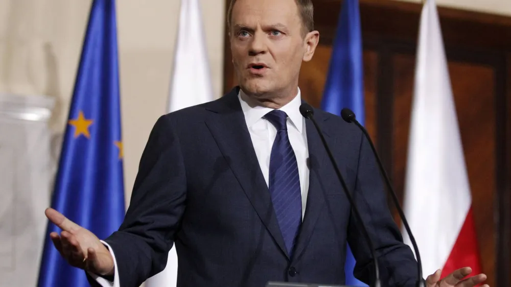 Poland's Prime Minister Donald Tusk speaks to the media during a news conference at the Prime Ministers Chancellery in Warsaw, January 13, 2011, following yesterday's IAC official report presented by Russian authorities. Russia's report into the plane crash that killed Poland's president is "incomplete" and Warsaw wants further talks with Moscow on the matter, Tusk said on Thursday. REUTERS/Peter Andrews (POLAND- Tags: DISASTER POLITICS)