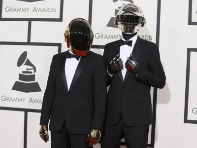 ﻿Daft Punk arrive at the 56th annual Grammy Awards in Los Angeles, California January 26, 2014.   REUTERS/Danny Moloshok (UNITED STATES - Tags: ENTERTAINMENT)  (GRAMMYS-ARRIVALS)
