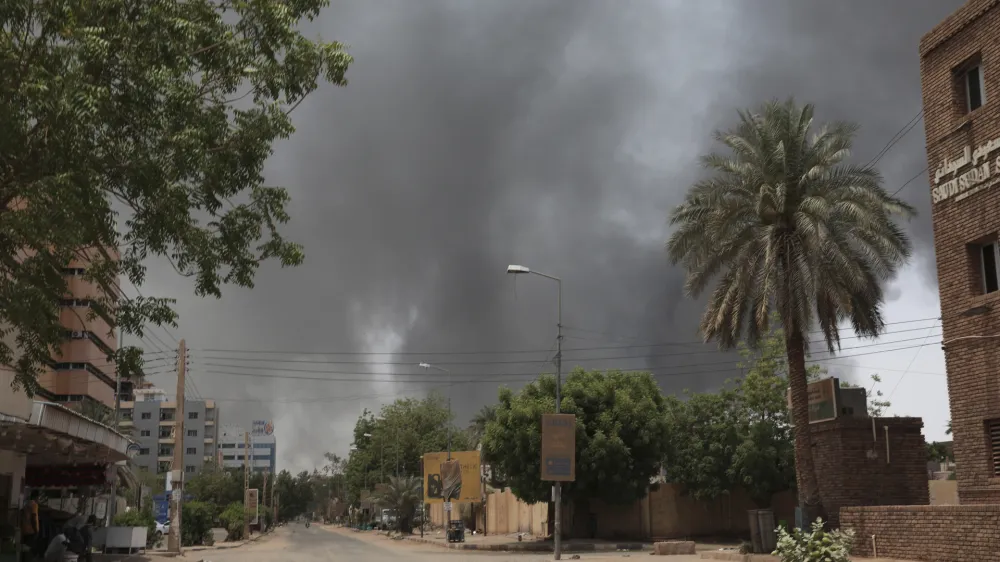 Smoke is seen rising in Khartoum, Sudan, Saturday, April 15, 2023. Fierce clashes between Sudan's military and the country's powerful paramilitary erupted in the capital and elsewhere in the African nation after weeks of escalating tensions between the two forces. (AP Photo/Marwan Ali)