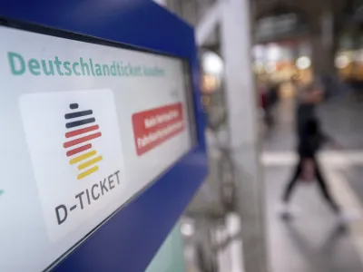 A notice for the Deutschlandticket (Germany Ticket) is displayed on a ticket vending machine at Frankfurt's main train station, Germany, Monday, May 1, 2023. Public transit companies in Germany say more than three million people have already snapped up a new ticket being launched Monday that allows them to use all local and regional trains, buses and metros across the country for 49 euros (.90) a month. (Sebastian Gollnow/dpa via AP)