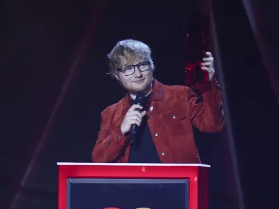 ﻿Ed Sheeran receives the Global Success Award at the Brit Awards 2018 in London, Wednesday, Feb. 21, 2018. (Photo by Joel C Ryan/Invision/AP)