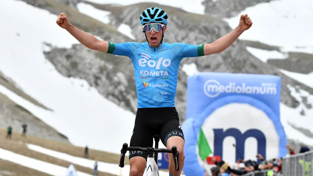 Cycling - Giro d'Italia - Stage 7 - Capua to Gran Sasso d'Italia - Italy - May 12, 2023 EOLO &ndash; Kometa's Davide Bais celebrates winning stage 7 REUTERS/Jennifer Lorenzini