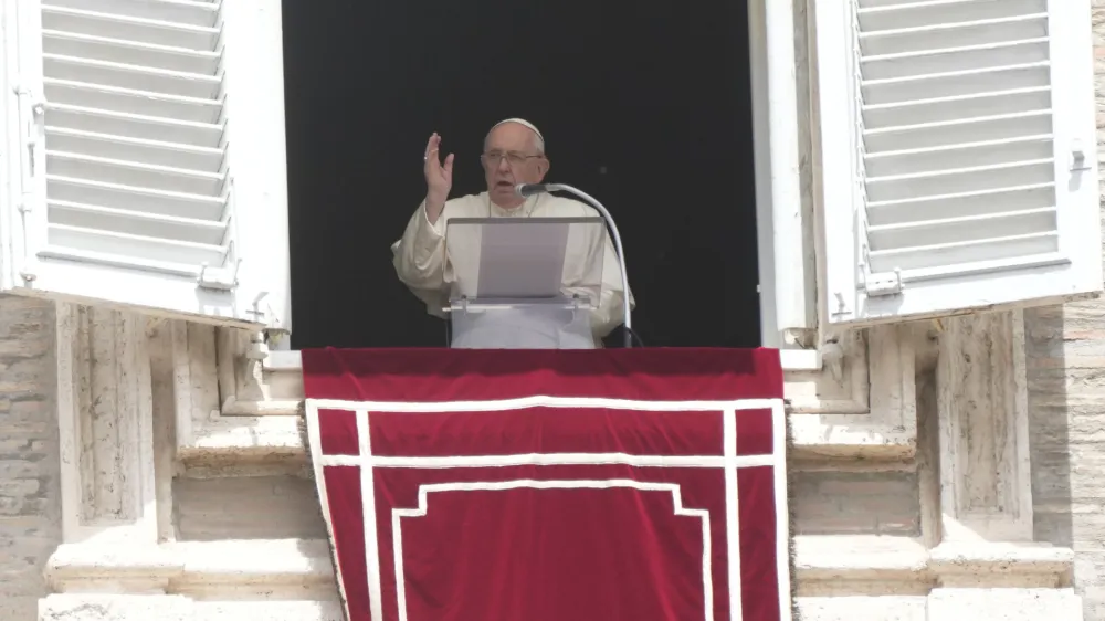 Pope Francis delivers the Regina Coeli noon prayer in St. Peter's Square at the Vatican, Sunday, May 14, 2023. (AP Photo/Gregorio Borgia)
