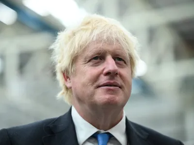 Britain's Prime Minister Boris Johnson during a visit to the Airbus UK East Factory in Broughton, North Wales, Friday, Aug. 12, 2022. (Oli Scarff/Pool Photo via AP)