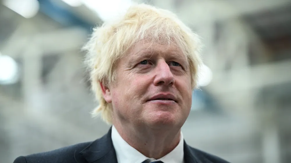 Britain's Prime Minister Boris Johnson during a visit to the Airbus UK East Factory in Broughton, North Wales, Friday, Aug. 12, 2022. (Oli Scarff/Pool Photo via AP)