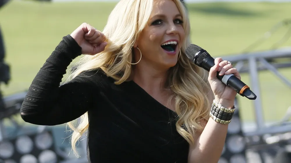 ﻿Britney Spears introduces Bruno Mars at the 2013 Wango Tango concert at the Home Depot Center in Carson, California May 11, 2013. REUTERS/Danny Moloshok (UNITED STATES - Tags: ENTERTAINMENT)