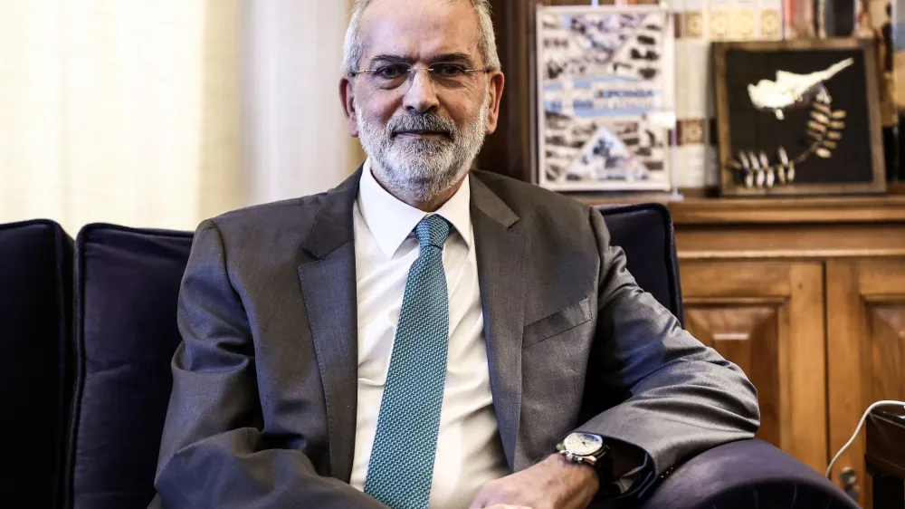President of the Court of Audit Ioannis Sarmas who will be sworn-in as caretaker prime minister meets with Greek President Katerina Sakellaropoulou (not pictured) at the Presidential Palace in Athens, Greece, May 24, 2023. Theodore Manolopoulos/Greek Presidency/Handout via REUTERS ATTENTION EDITORS - THIS IMAGE HAS BEEN SUPPLIED BY A THIRD PARTY.