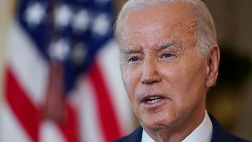 U.S. President Joe Biden speaks as he marks the first anniversary of the school shooting at Robb Elementary School in Uvalde, Texas, during an event at the White House in Washington, U.S., May 24, 2023. REUTERS/Kevin Lamarque