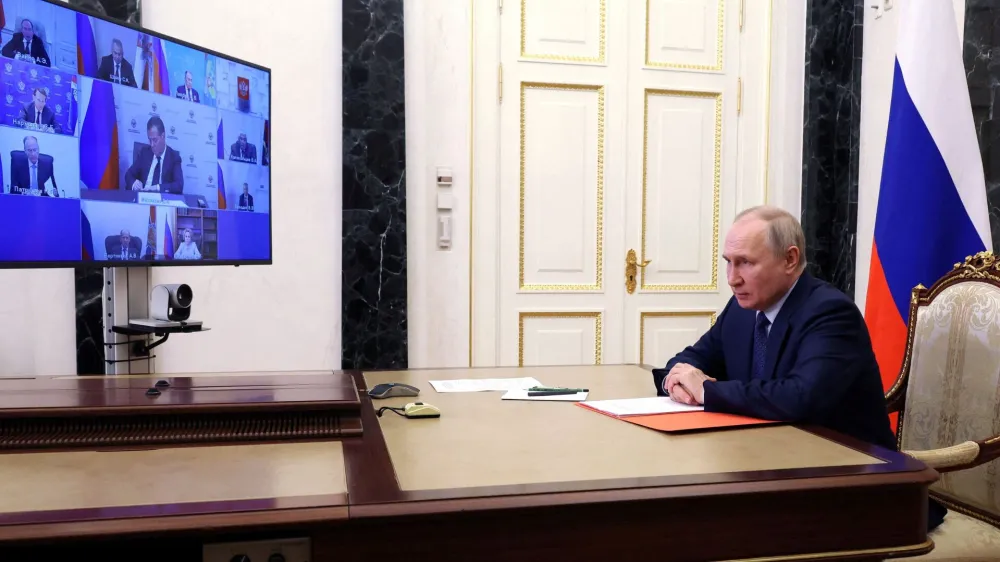 FILE PHOTO: Russian President Vladimir Putin chairs a meeting with members of the Security Council via a video link in Moscow, Russia May 26, 2023. Sputnik/Mikhail Klimentyev/Kremlin via REUTERS ATTENTION EDITORS - THIS IMAGE WAS PROVIDED BY A THIRD PARTY./File Photo