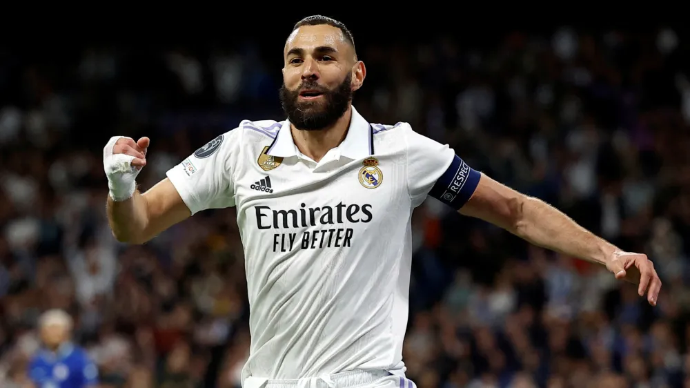 FILE PHOTO: Soccer Football - Champions League - Quarter Finals - First Leg - Real Madrid v Chelsea - Santiago Bernabeu, Madrid, Spain - April 12, 2023 Real Madrid's Karim Benzema celebrates scoring their first goal REUTERS/Juan Medina/File Photo