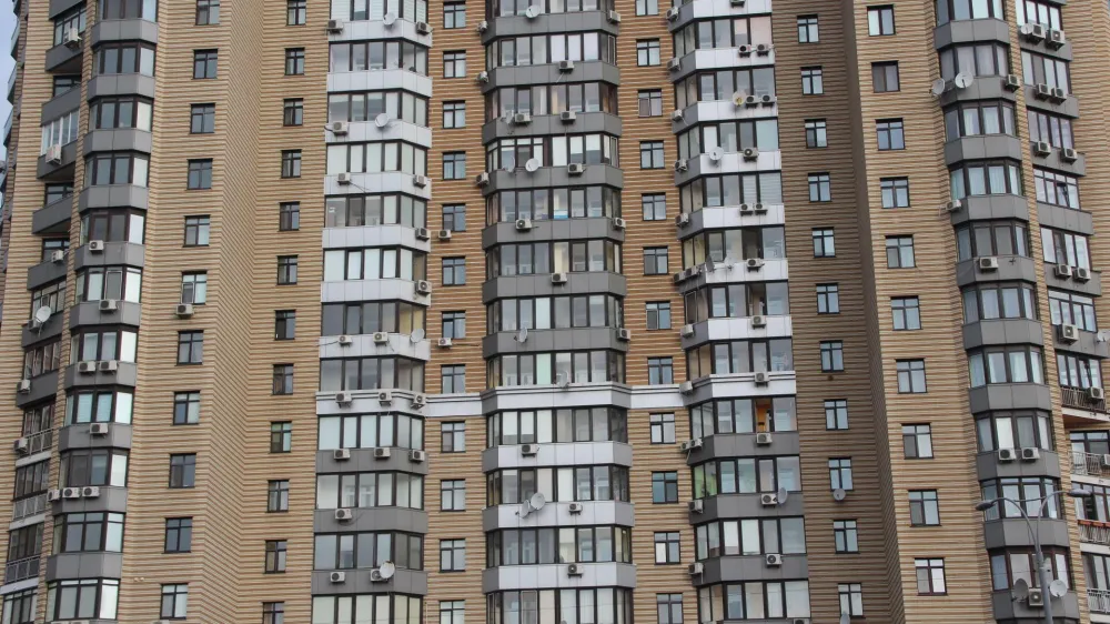 2M6ECBN Windows of neighbors in house opposite. View of multistory modern blocks of flat in Kyiv. Urban arch<br>Sosedi, soseska, blok
