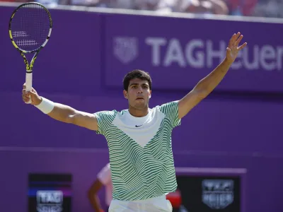 Tennis - ATP 500 - Queen's Club Championships - Queen's Club, London, Britain - June 25, 2023 Spain's Carlos Alcaraz celebrates after winning his final match against Australia's Alex de Minaur Action Images via Reuters/Peter Cziborra