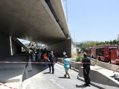 People are seen at the site of a bridge that collapsed in Patras, Greece, July 23, 2023. Andreas Alexopoulos/Intime News via REUTERS ATTENTION EDITORS - THIS IMAGE HAS BEEN SUPPLIED BY A THIRD PARTY. NO RESALES. NO ARCHIVES. GREECE OUT. NO EDITORIAL SALES IN GREECE REFILE - QUALITY REPEAT