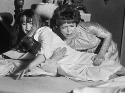Linda Blair and Ellen Burstyn in the movie the Exorcist