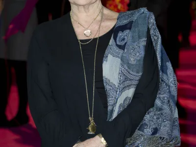 British actress, Judi Dench, arrives for 'The Best Exotic Marigold Hotel' world premiere at a central London venue, Tuesday, Feb. 7, 2012. (AP Photo/Jonathan Short)