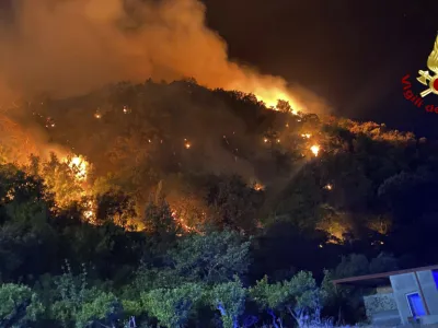 This picture released by the Italian firefighters shows wildfires in the region of Palermo in Sicily, Italy, Tuesday July 25, 2023. (Italian Firefighters - Vigili del Fuoco via AP)