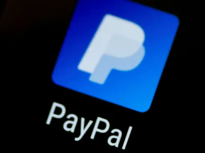 FILE PHOTO: The PayPal app logo seen on a mobile phone in this illustration photo October 16, 2017. REUTERS/Thomas White/File Photo