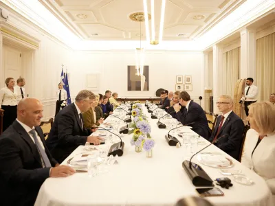 Greek Prime Minister Kyriakos Mitsotakis, European Commission President Ursula von der Leyen, President of the European Council Charles Michel, Serbian President Aleksandar Vucic, Moldovan President Maia Sandu, Ukraine's President Volodymyr Zelenskiy, Montenegro's President Jakov Milatovic, Romanian Prime Minister Marcel Ciolacu, Kosovo's Prime Minister Albin Kurti, Chairwoman of the Council of Ministers of Bosnia and Herzegovina Borjana Kristo, North Macedonia's Prime Minister Dimitar Kovacevski, Bulgarian Prime Minister Nikolai Denkov and Croatian Prime Minister Andrej Plenkovic attend a dinner at the Maximos Mansion in Athens, Greece, August 21, 2023. Dimitris Papamitsos/Greek Prime Minister's Office/Handout via REUTERS THIS IMAGE HAS BEEN PROVIDED BY A THIRD PARTY
