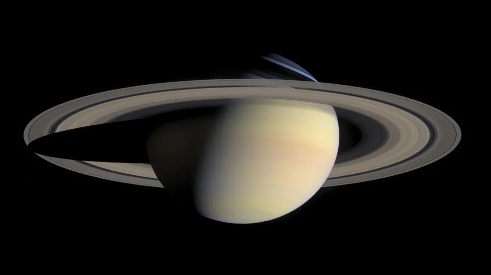 This image provided by NASA, taken Oct. 6, 2004, by the Cassini Saturn Probe, shows the planet Saturn and its rings. One of the most evocative mysteries of the solar system, where Saturn got its stunning rings, may actually be a case of cosmic murder with an unnamed moon of Saturn, that disappeared about 4.5 billion years ago, as the potential victim. Suspicion has fallen on a disk of hydrogen gas, that surrounded Saturn when its dozens of moons were forming, but has now fled the scene. And the cause of death? A possible forced plunge into Saturn. (AP Photo/NASA)