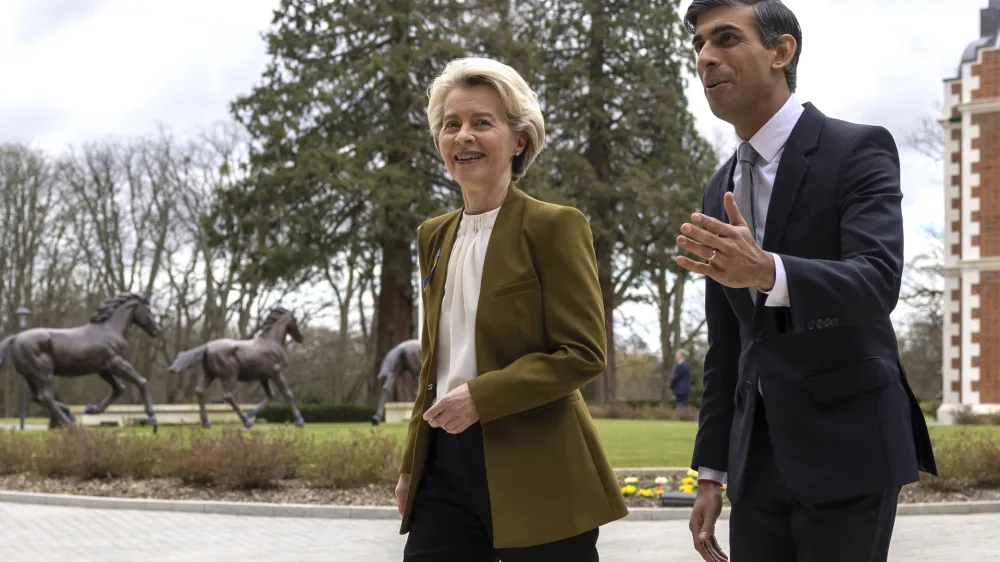 Britain's Prime Minister Rishi Sunak, right, greets European Commission President Ursula von der Leyen at the Fairmont Hotel in Windsor, England, Monday Feb. 27, 2023. The U.K. and the European Union were poised Monday to end years of wrangling and seal a deal to resolve their thorny post-Brexit trade dispute over Northern Ireland. Striking an agreement at a meeting with European Commission President Ursula von der Leyen would be a big victory for Prime Minister Rishi Sunak — but not the end of his troubles. (Dan Kitwood/Pool via AP)