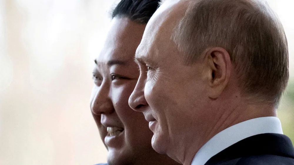 FILE PHOTO: FILE PHOTO: Russian President Vladimir Putin and North Korea's leader Kim Jong Un pose for a photo during their meeting in Vladivostok, Russia, April 25, 2019. Picture taken April 25, 2019. Alexander Zemlianichenko/Pool via REUTERS/File Photo