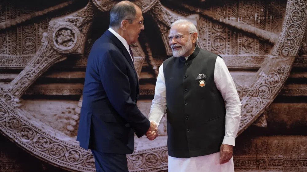 Indian Prime Minister Narendra Modi welcomes Russian Foreign Minister Sergei Lavrov upon his arrival at Bharat Mandapam convention center for the G20 Summit, in New Delhi, India, Saturday, Sept. 9, 2023. (AP Photo/Evan Vucci,Pool)
