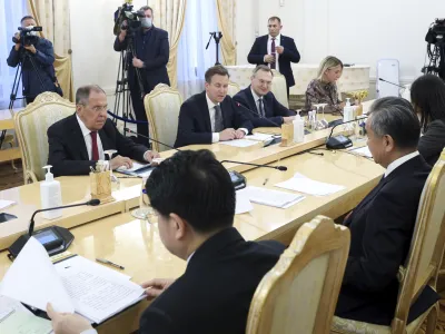 In this photo released by Russian Foreign Ministry Press Service, Russian Foreign Minister Sergey Lavrov, left, speaks with Chinese Foreign Minister Wang Yi during their talks in Moscow, Russia, Monday, Sept. 18, 2023. (Russian Foreign Ministry Press Service via AP)