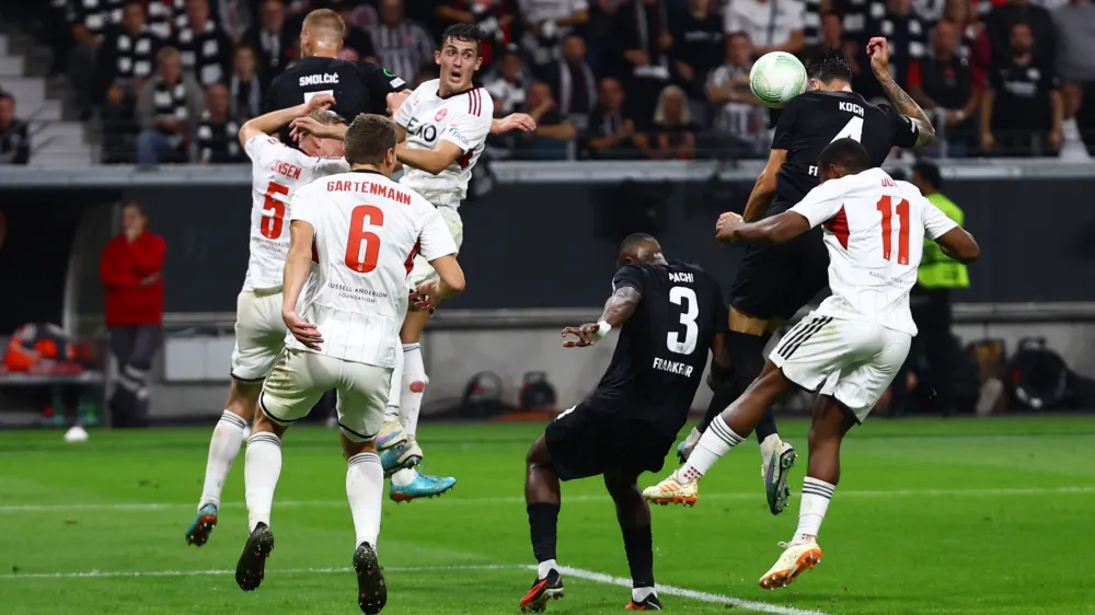 Soccer Football - Europa Conference League - Group G - Eintracht Frankfurt v Aberdeen - Deutsche Bank Park, Frankfurt, Germany - September 21, 2023 Eintracht Frankfurt's Robin Koch scores their second goal REUTERS/Kai Pfaffenbach