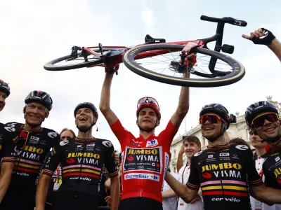 Cycling - Vuelta a Espana - Stage 21 - Hipodromo de la Zarzuela to Madrid - Spain - September 17, 2023 Team Jumbo&ndash;Visma's Sepp Kuss celebrates with teammates after winning Vuelta a Espana REUTERS/Susana Vera