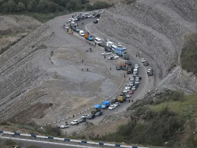 Ethnic Armenians flee Nagorno-Karabakh to Kornidzor, in Armenia's Syunik region, Tuesday, Sept. 26, 2023. (AP Photo/Vasily Krestyaninov)