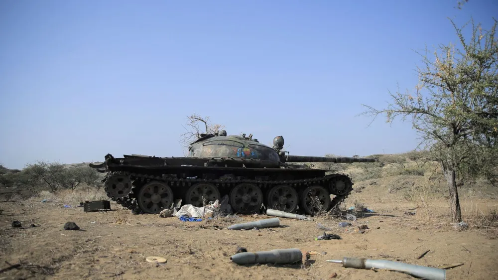 FILE PHOTO: Ammunition is seen next to a tank destroyed in a fight between the Ethiopian National Defence Force (ENDF) and the Tigray People's Liberation Front (TPLF) forces in Kasagita town, Afar region, Ethiopia, February 25, 2022. Picture taken February 25, 2022.REUTERS/Tiksa Negeri/File Photo